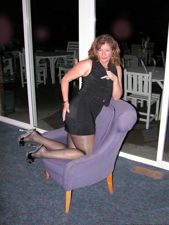 13P Mature woman Devlynn takes off her dress and heels while playing with her twat