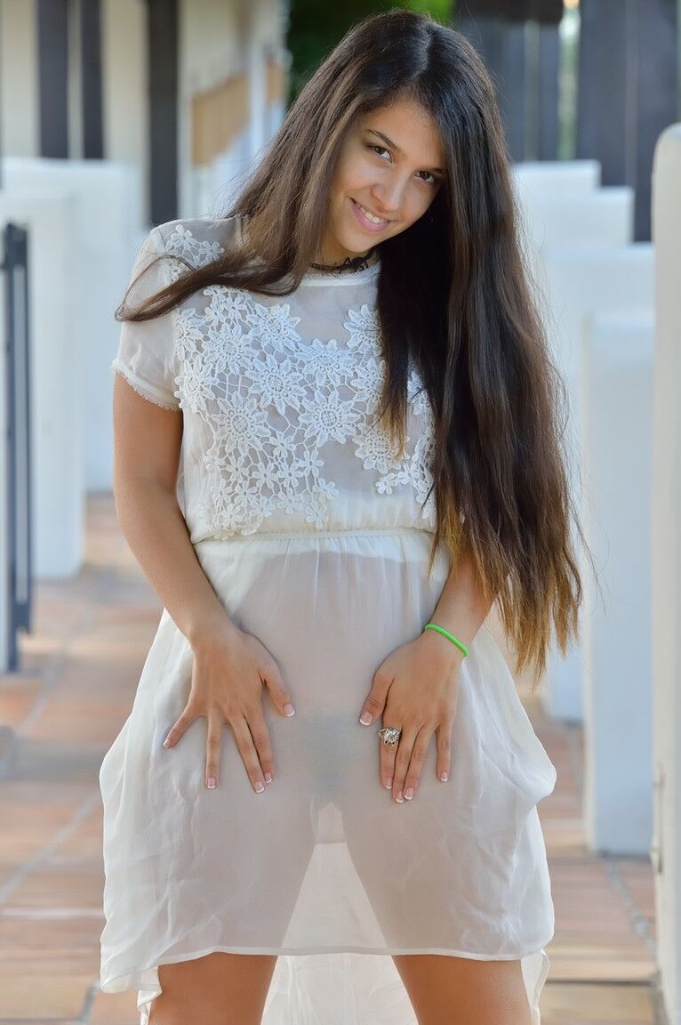 21P Busty babe Caroline lifts her dress up & inserts a banana in her fuzzy pussy