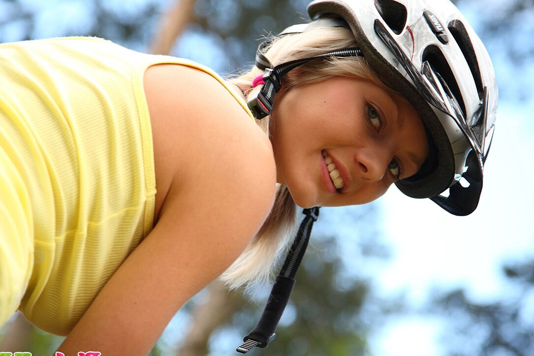 15P Cute teen Pinky June spreads her legs wide open to masturbate in a helmet