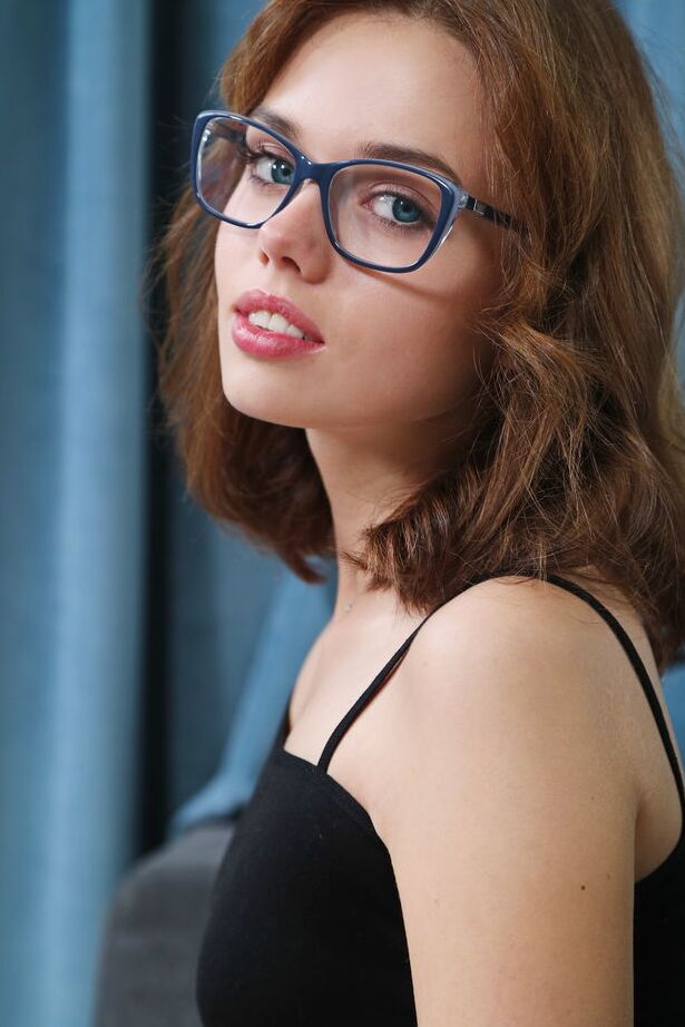 18P Geeky teen Keira Blue gets bare naked on a sofa over a glass of wine
