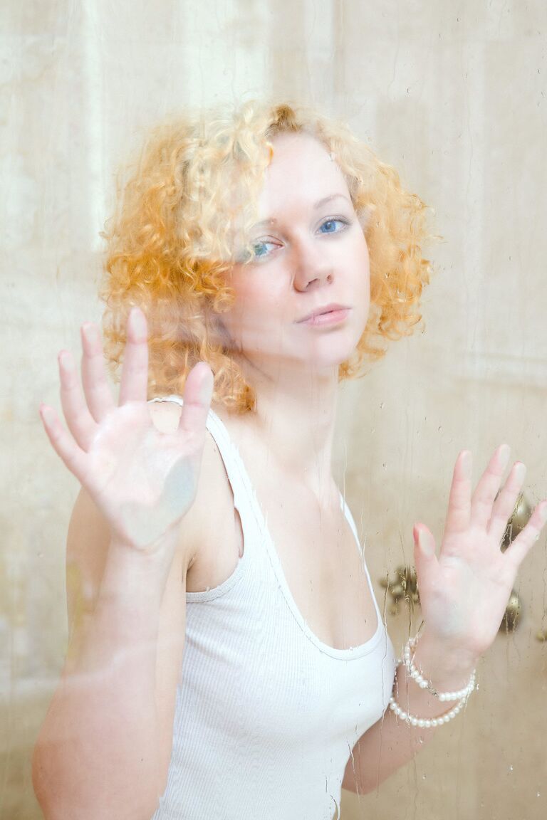 17P Redhead with curly hair gets wet while taking off her clothes in the shower