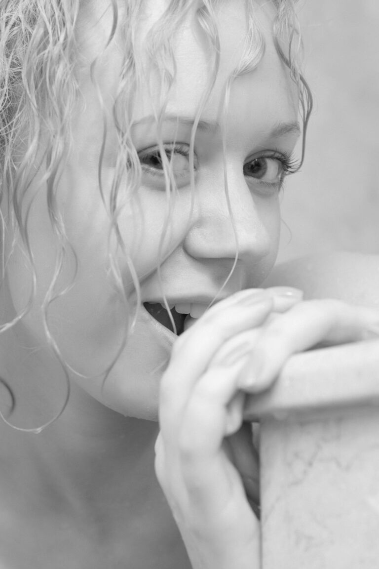 17P Redhead with curly hair gets wet while taking off her clothes in the shower