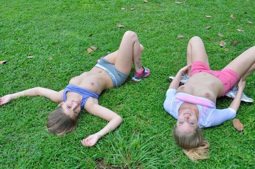15P Lesbian girls flash their tits and asses on a public sidewalk