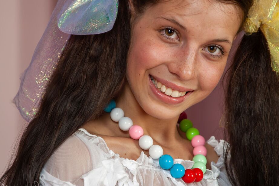 16P Young girl Anoushka E wears ribbon in her pigtails while sporting booty shorts