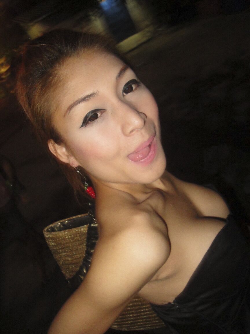 17P Stunning ladyboy Yoyo exposing her perfect big tits and curved dick