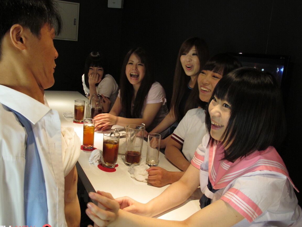 21P Asian cutie Mio Kosaki and her friends suck and jerk off dongs in a bar