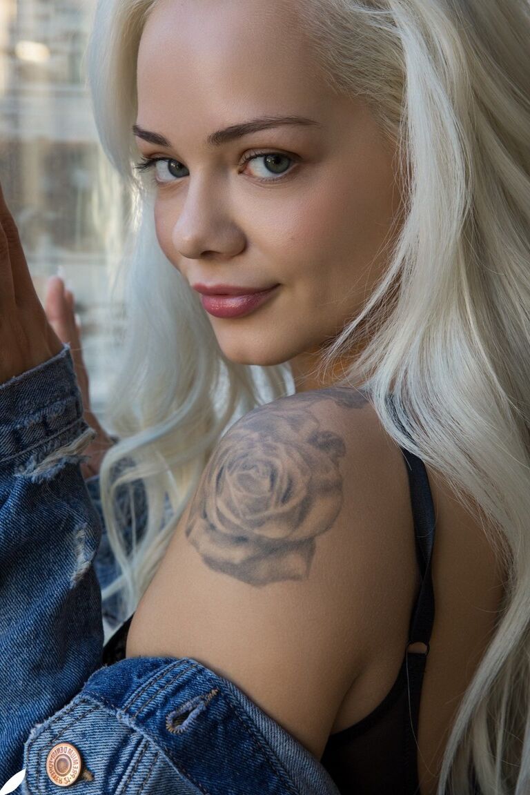 17P Petite blonde with perfect face Elsa Jean teases while taking off her clothes