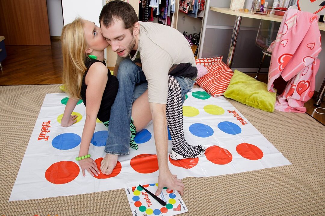 15P Young looking girl goes PTM after a game of Twister in over the knee socks