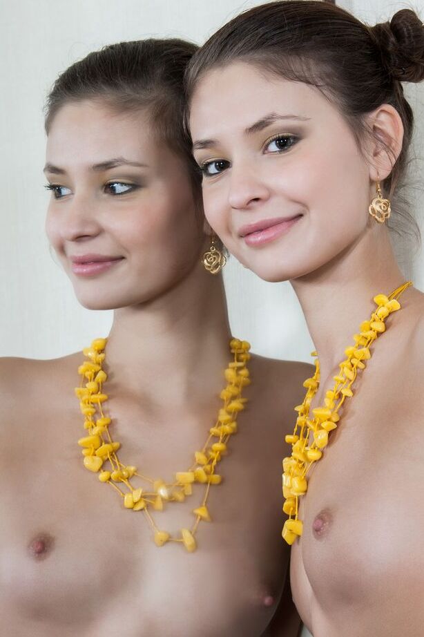16P Cute teen Irina J admires herself in mirror wearing only yellow hose