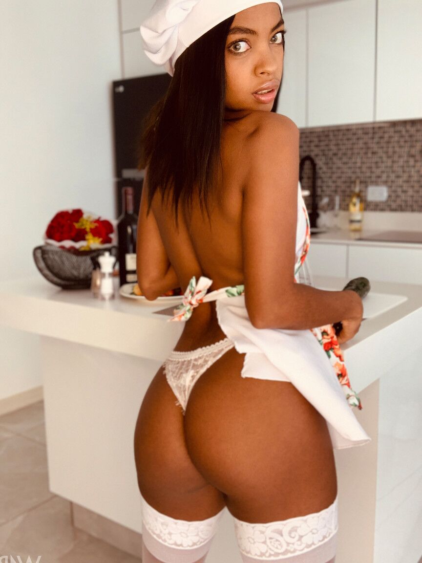 21P Sexy Latina with tiny tits Sofi Vega reveals her cunt and poses in the kitchen