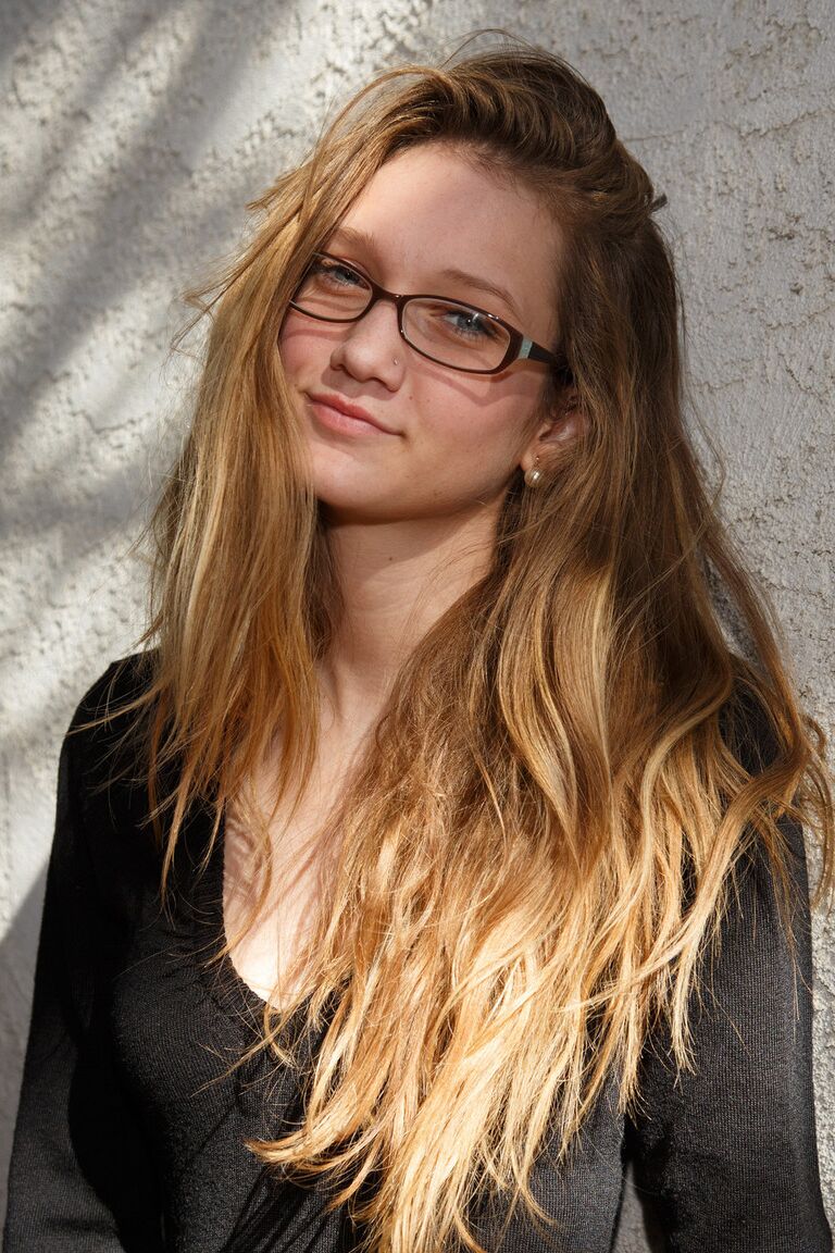 12P Slender long-haired teen Reese Berkman flashing an upskirt in public