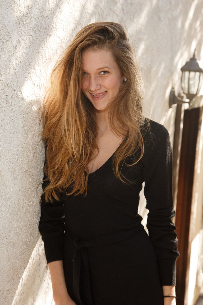 12P Slender long-haired teen Reese Berkman flashing an upskirt in public