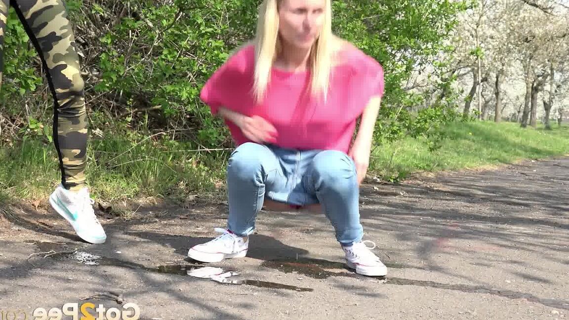 15P Blonde girls Debora & Vanessa Hell squat to pee on a path while out for a walk