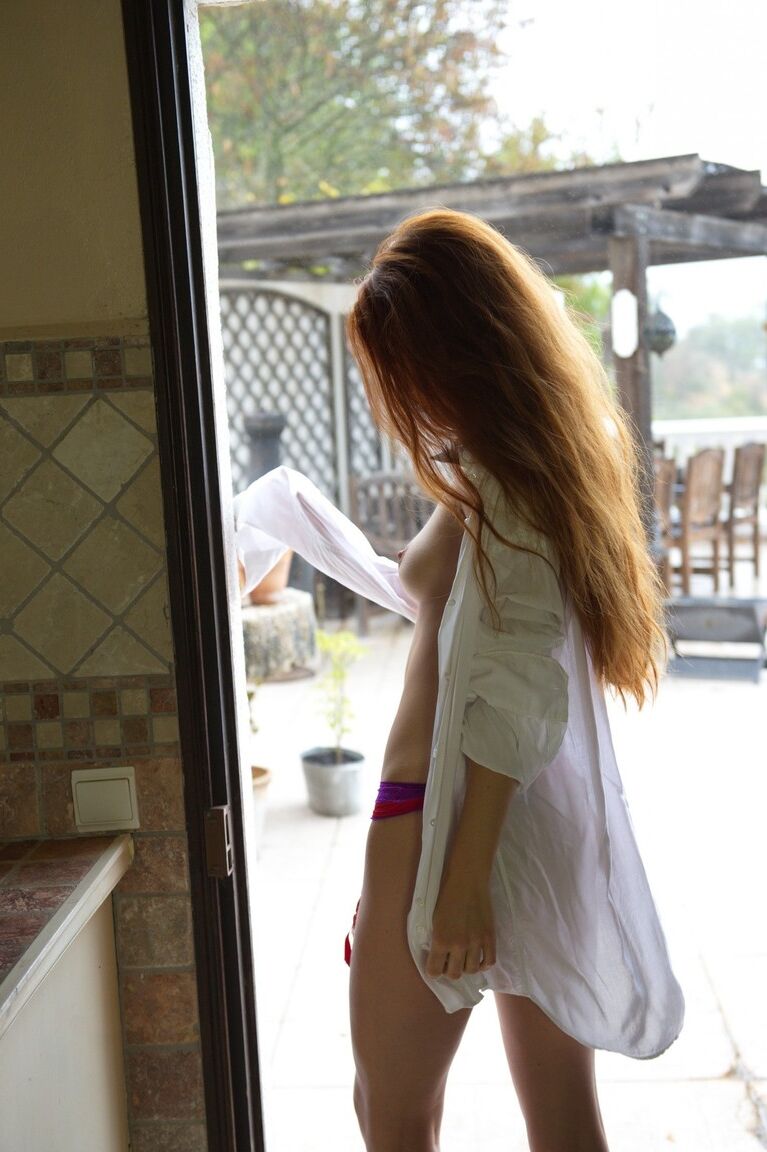 12P Redhead Mia Sollis pours a drink after loosing her small tits from a blouse