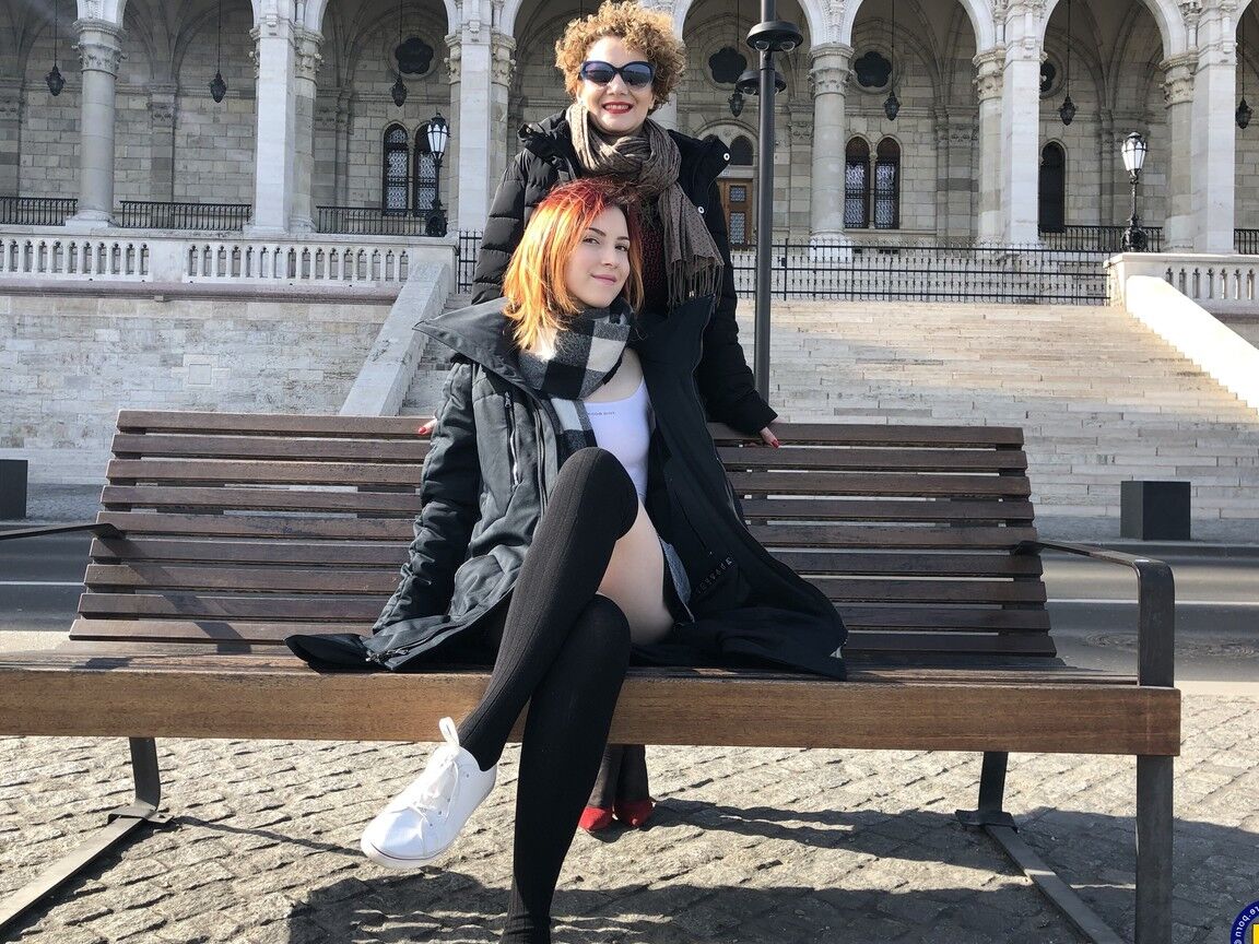 16P Older lady with curly hair fucks a young redhead with a strapon cock