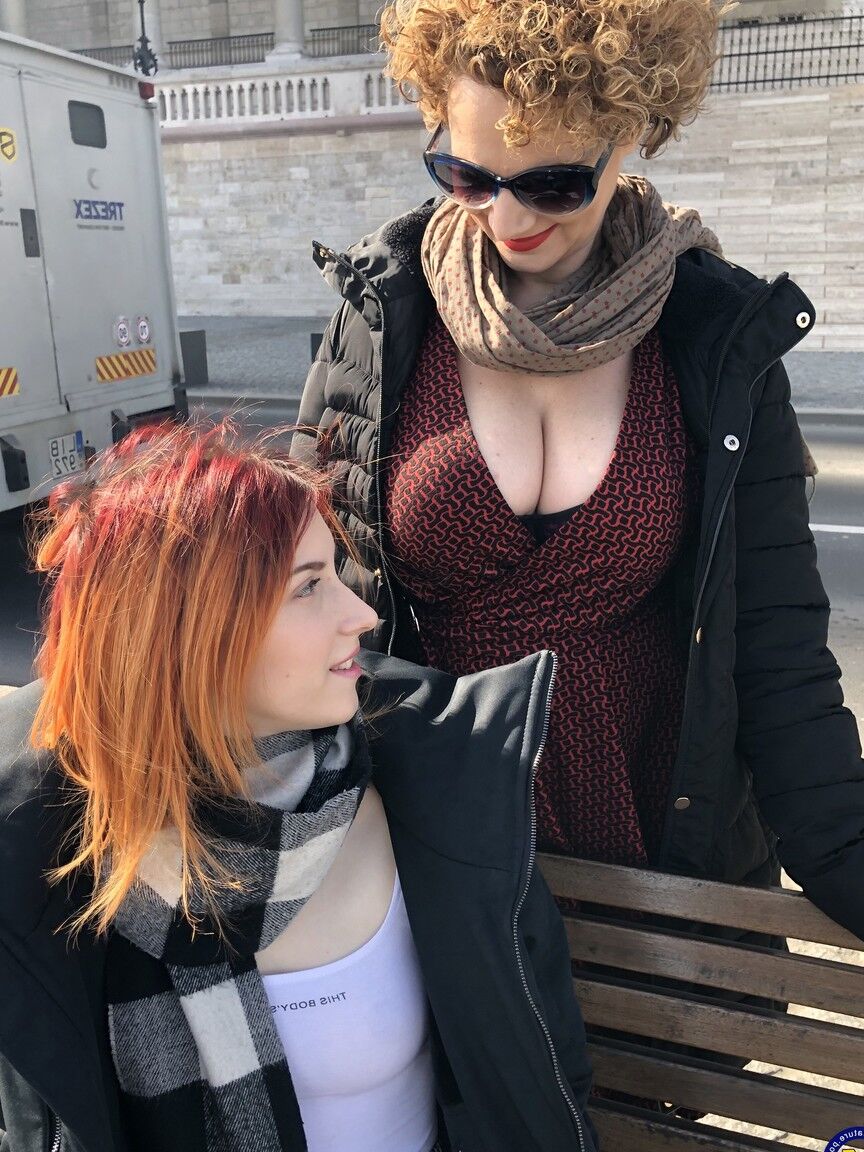 16P Older lady with curly hair fucks a young redhead with a strapon cock