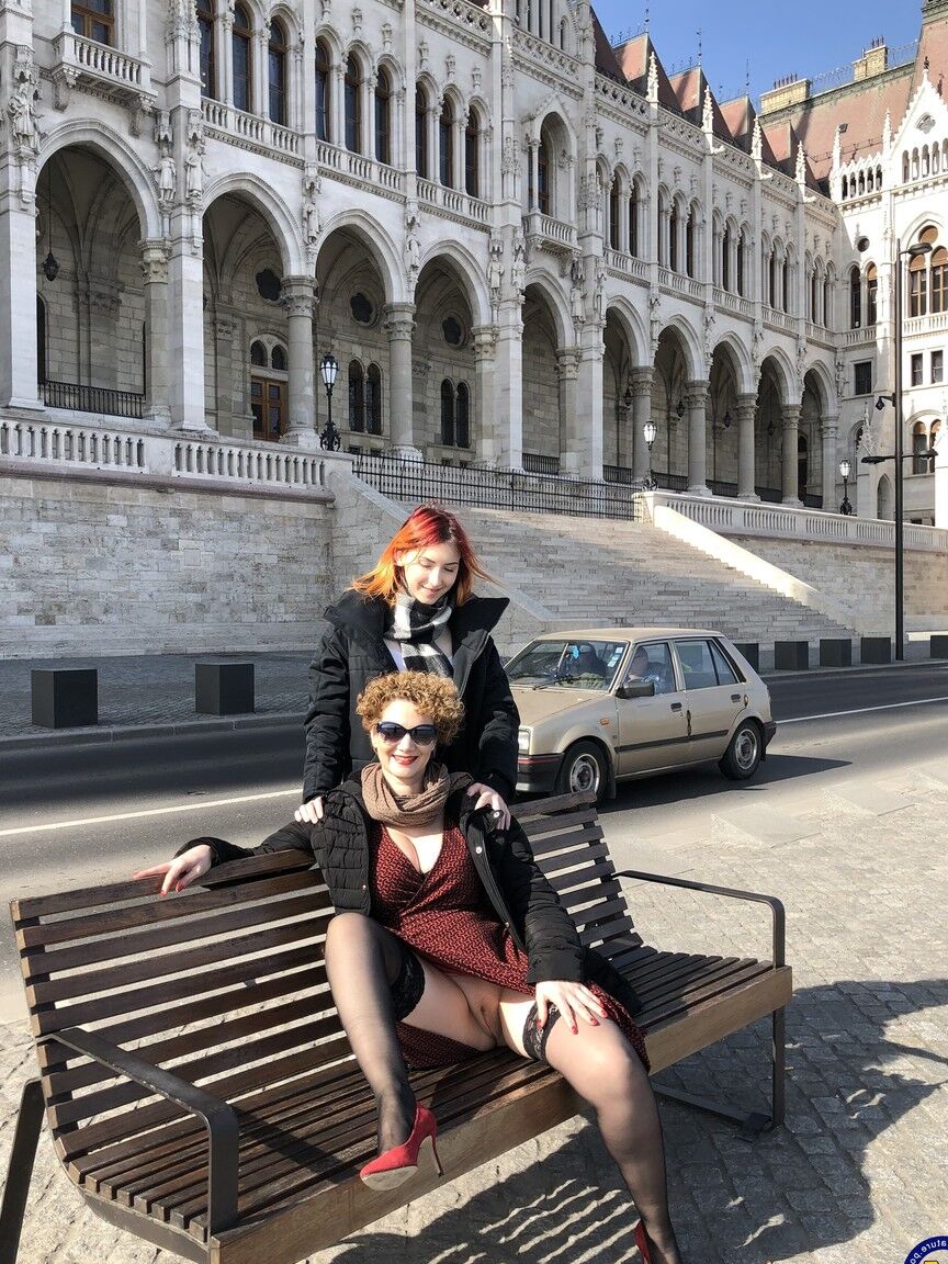 16P Older lady with curly hair fucks a young redhead with a strapon cock