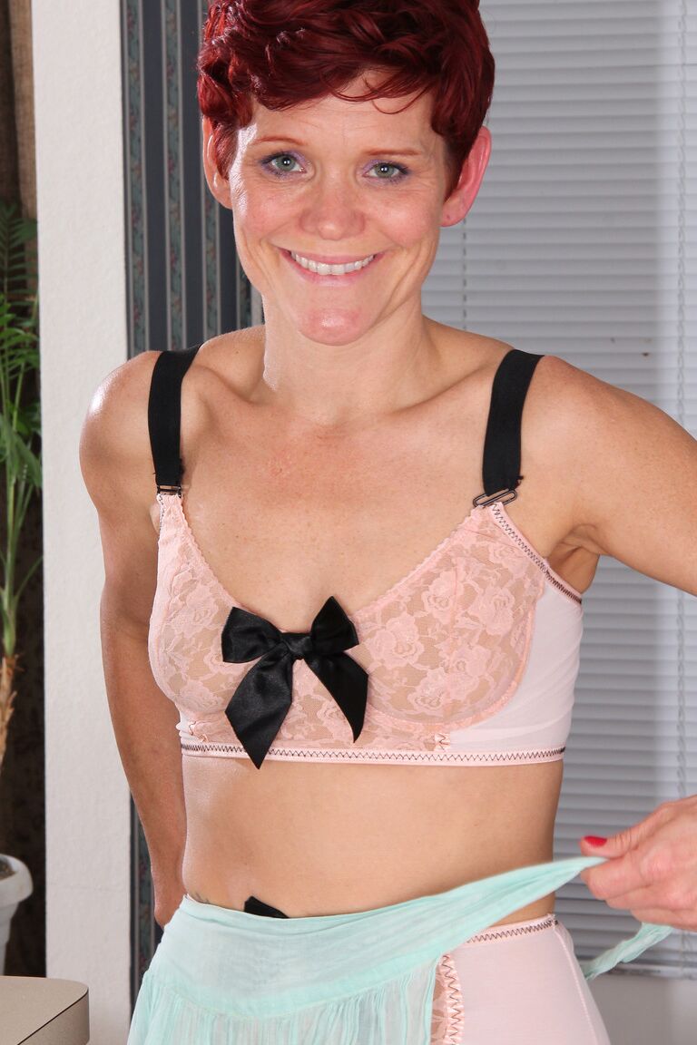 21P Ginger babe with small tits Suzy Stanton toys with kitchen utensils in a solo