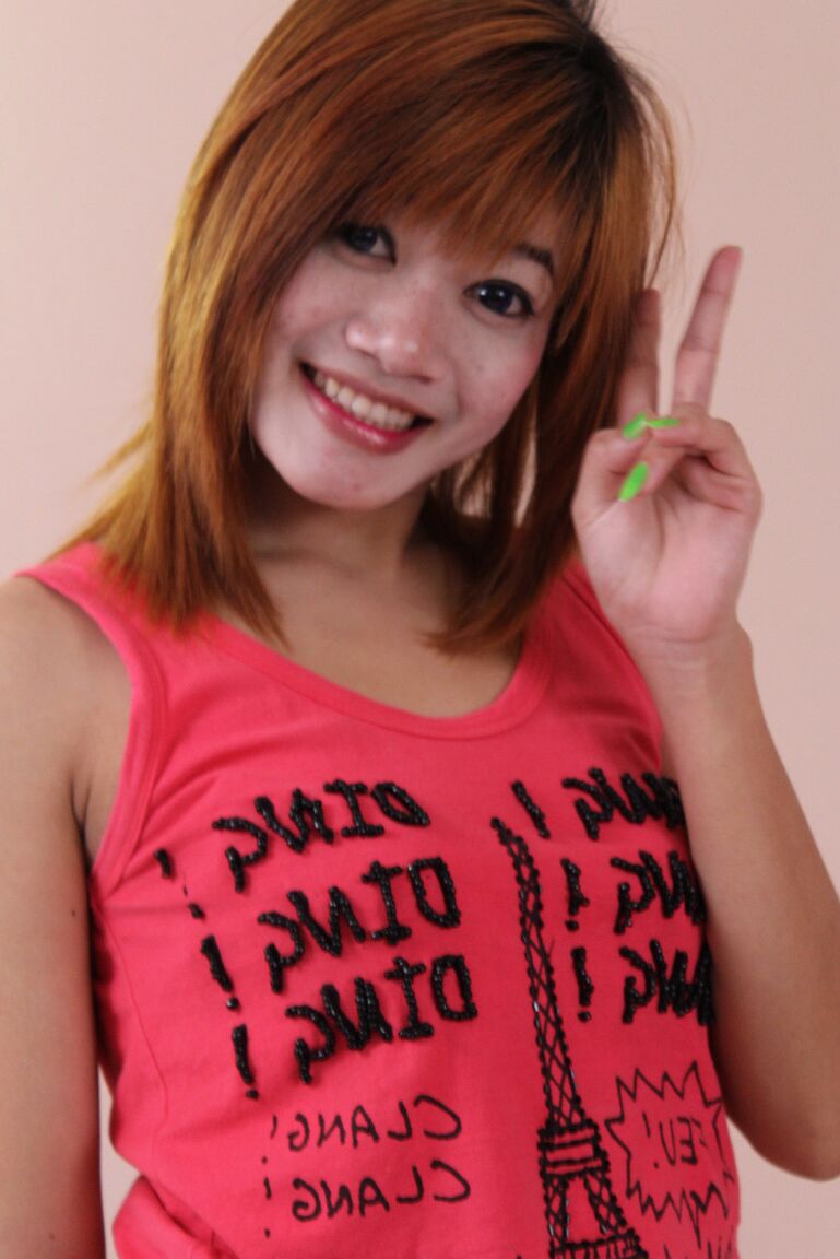 15P Young Asian redhead Oam looses her hairy muff from a bikini as she gets naked