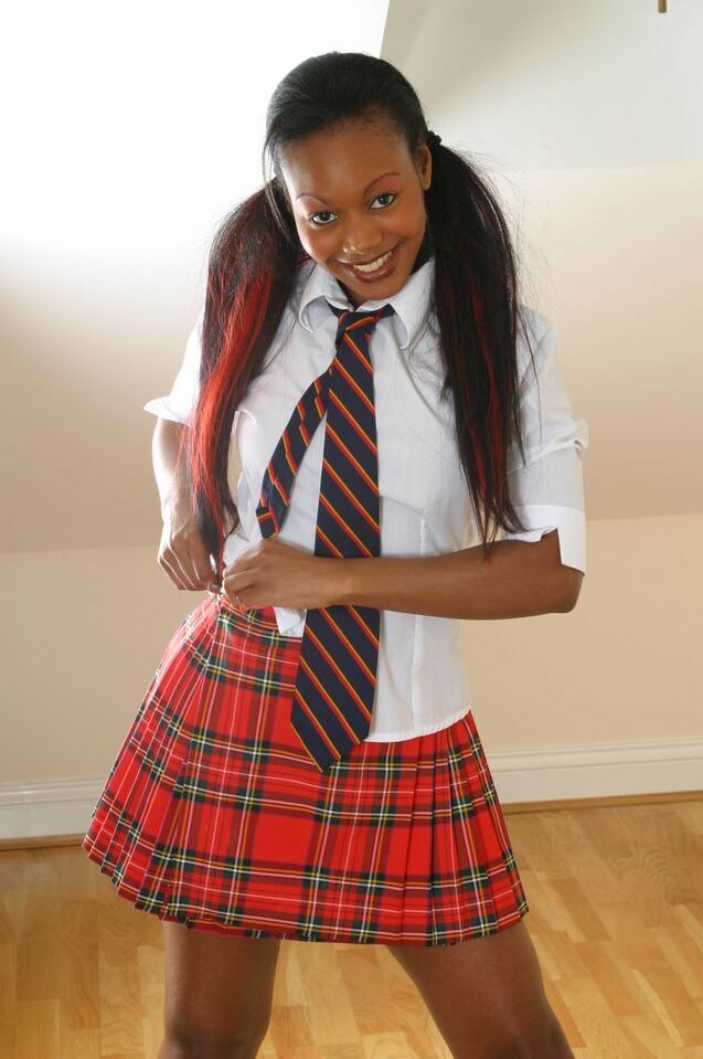 21P Sweet black schoolgirl Robyn S goes topless and poses in white panties