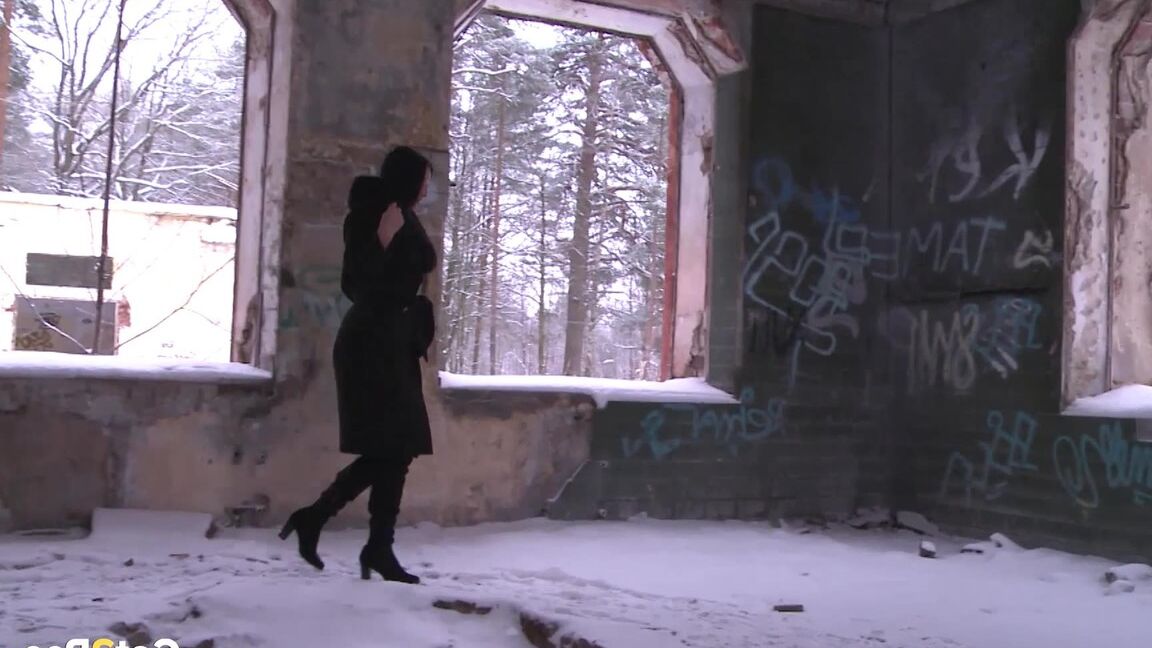 15P Brunette babe pisses in an abandoned building