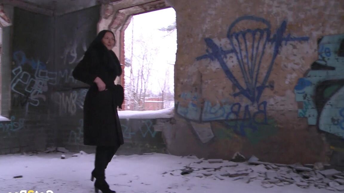 15P Brunette babe pisses in an abandoned building