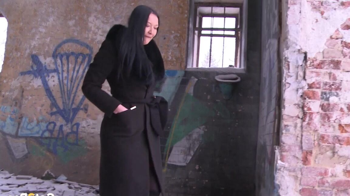 15P Brunette babe pisses in an abandoned building