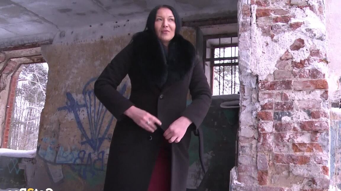 15P Brunette babe pisses in an abandoned building