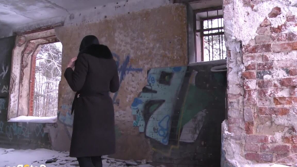 15P Brunette babe pisses in an abandoned building