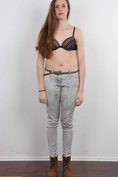 20P 18 year old amateur Alena stands naked after removing clothes and boots