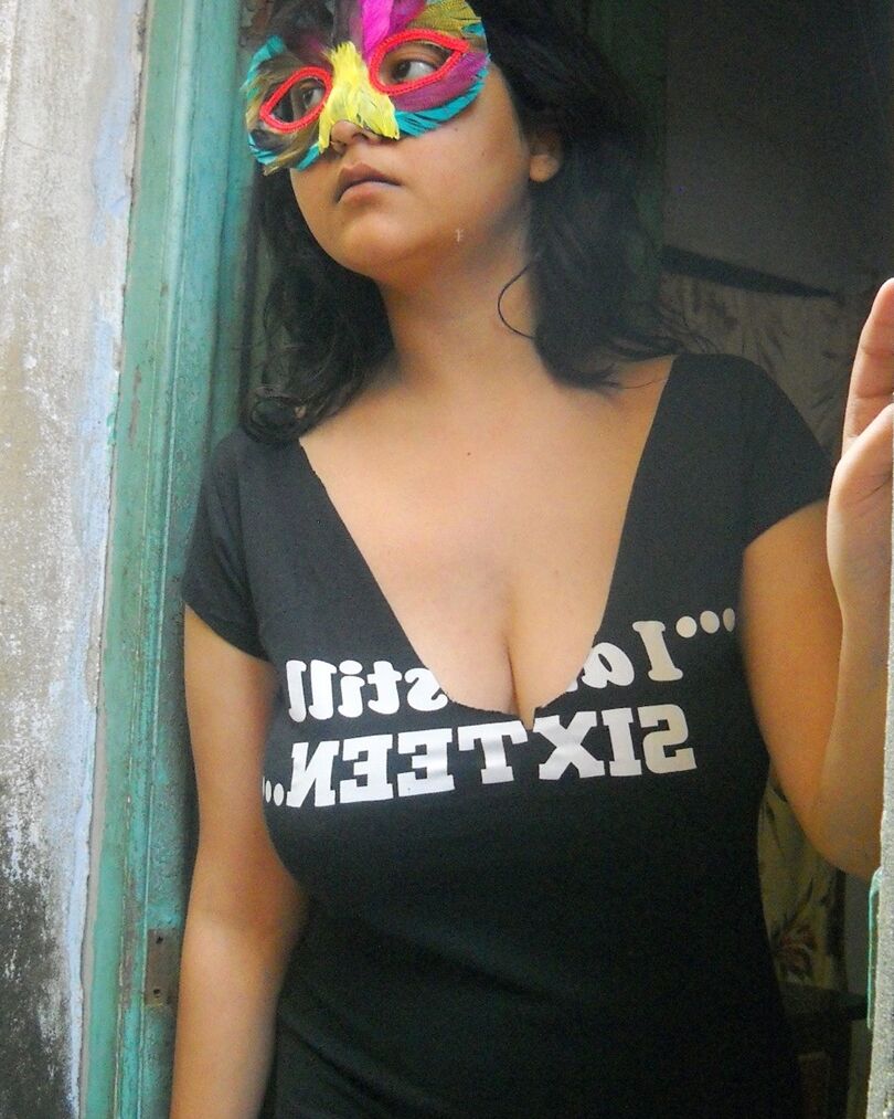 12P Indian amateur Savita Bhabhi wears a mask while playing with her shaved pussy