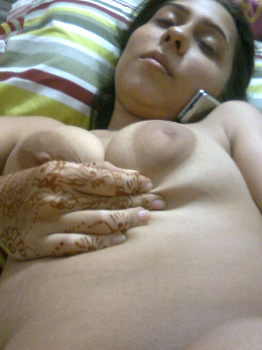 10P Sexy Indian chick uncups saggy tits while getting naked during self shots