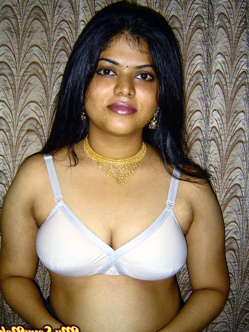 12P Chubby Indian girl Neha Nair lets her boobs spill forth from white bra