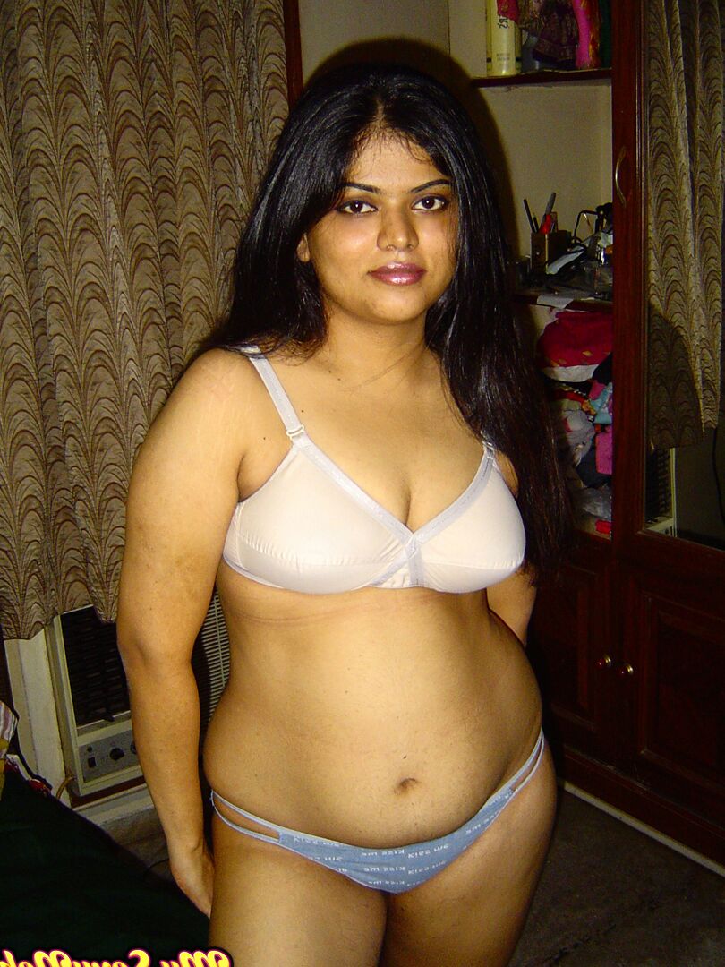 12P Chubby Indian girl Neha Nair lets her boobs spill forth from white bra