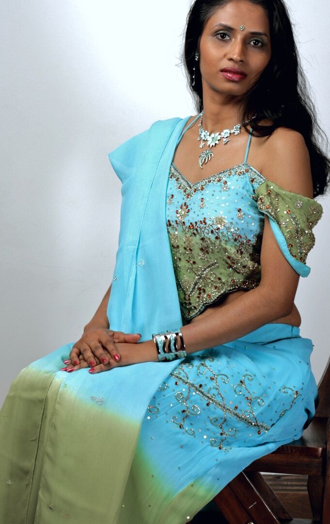 15P Indian woman models in a strapless bra and panties paired with red hosiery
