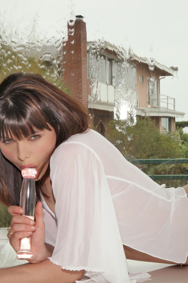 15P Sexy brunette Dillan uncovers her tiny tits and hard nipple in window sill