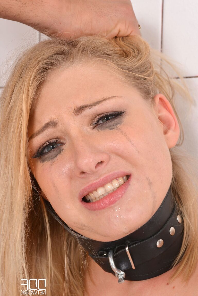 21P Submissive blonde babe Lucy Heart gets cuffed and ass banged by a dom