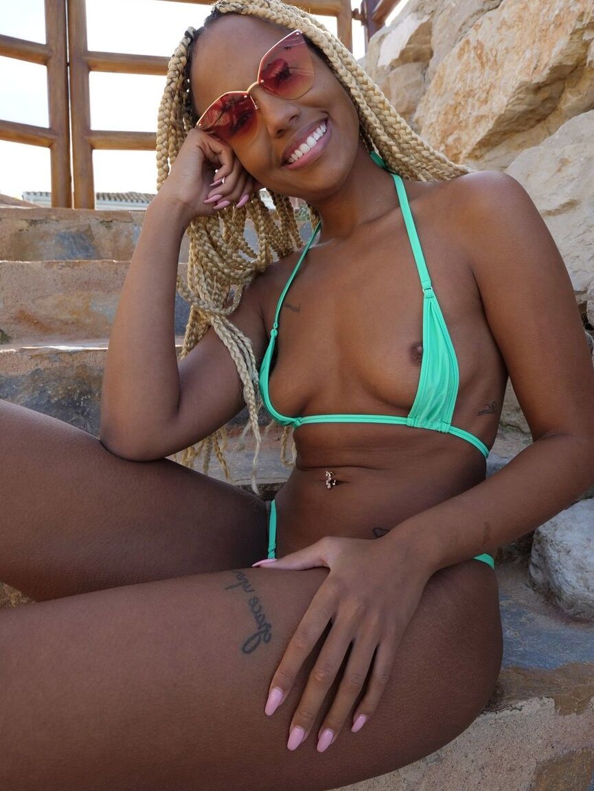 12P Romy is loving her naughty side today When modelling this micro bikini she