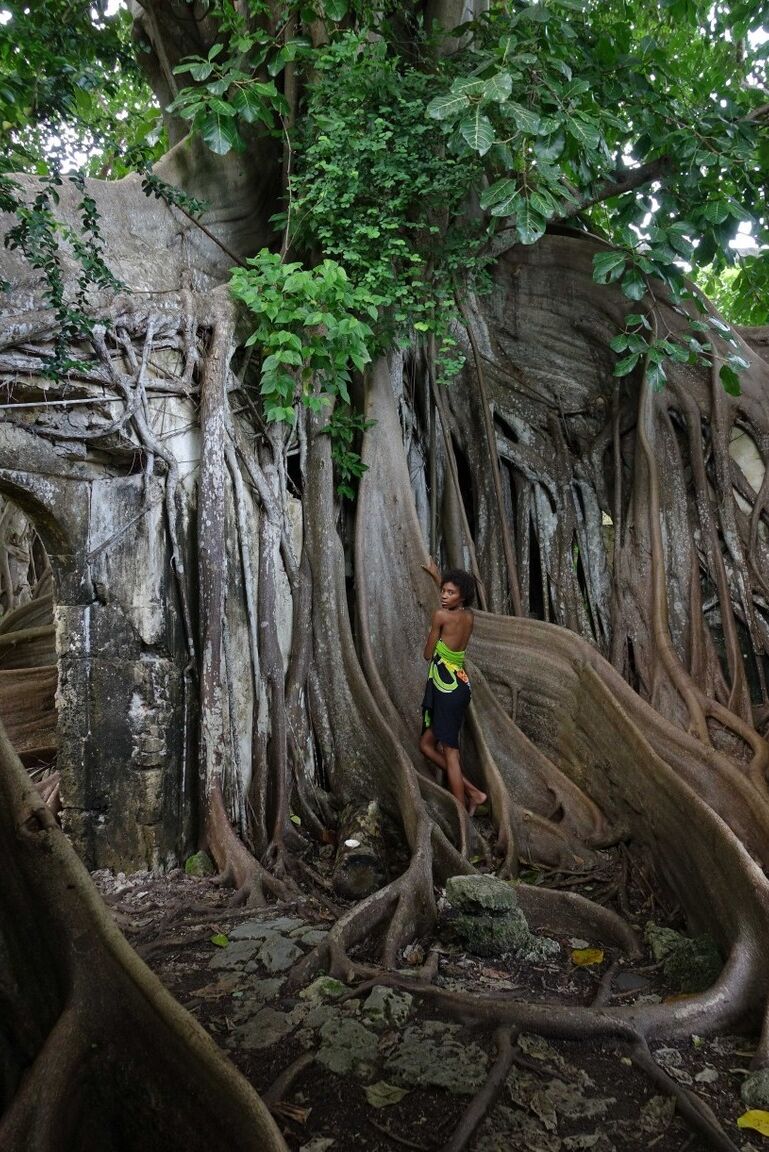 16P The sublime and slender girl walks in a former prison in Guadeloupe Its