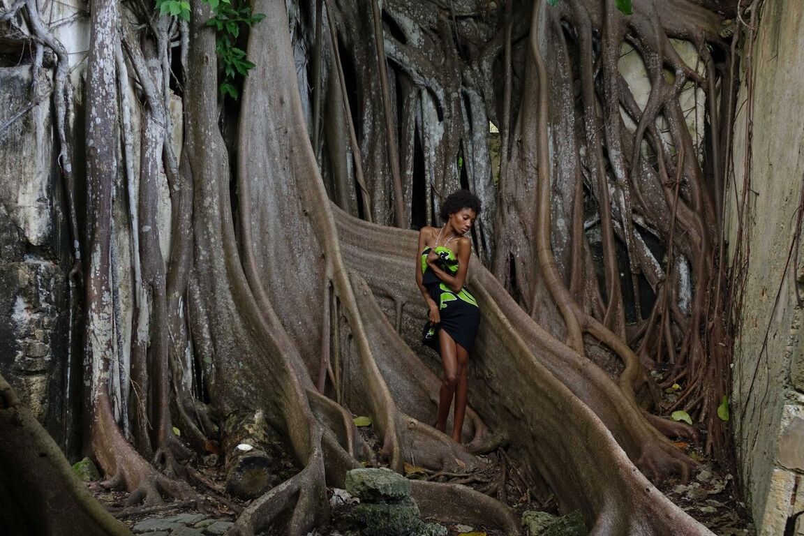 16P The sublime and slender girl walks in a former prison in Guadeloupe Its