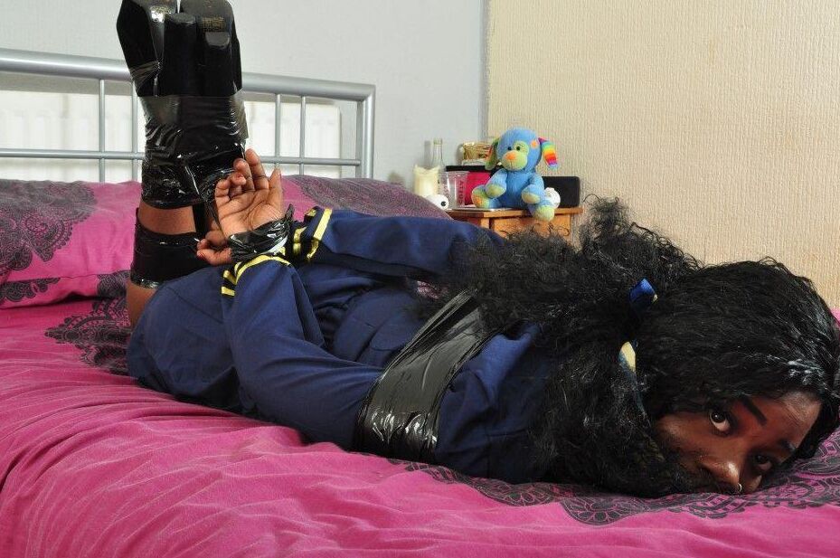 16P Black stewardess finds herself cleave gagged and hogtied on a bed