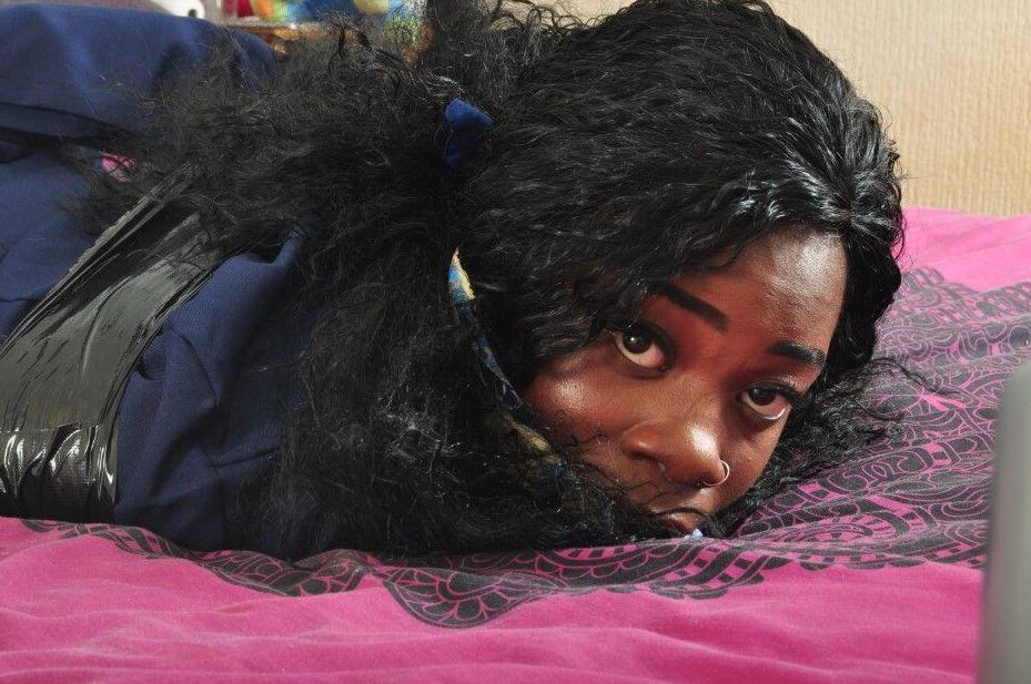 16P Black stewardess finds herself cleave gagged and hogtied on a bed