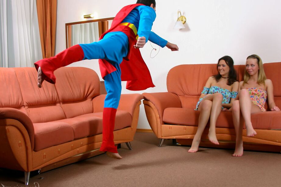 16P Young girls Kenia H and Brigitta F get jizz on their faces thanks to Superman