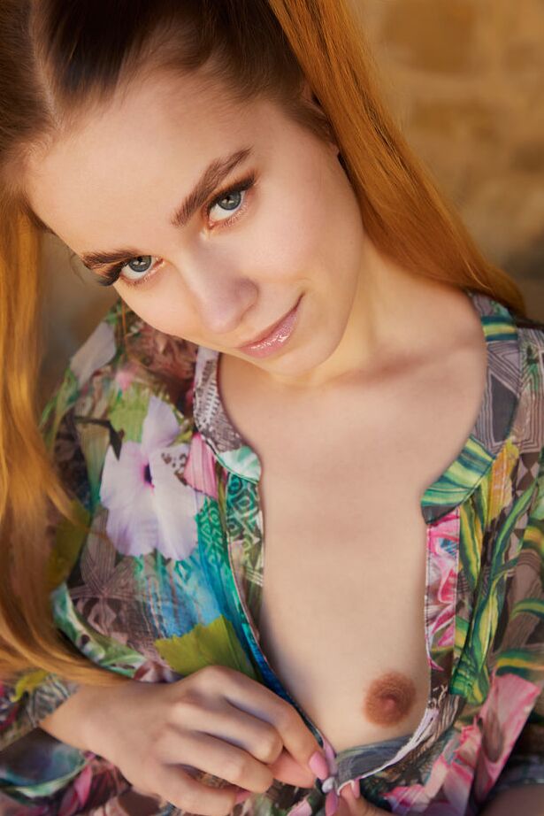 18P Young redhead Cassia spreads her legs wide open to show her nice pussy