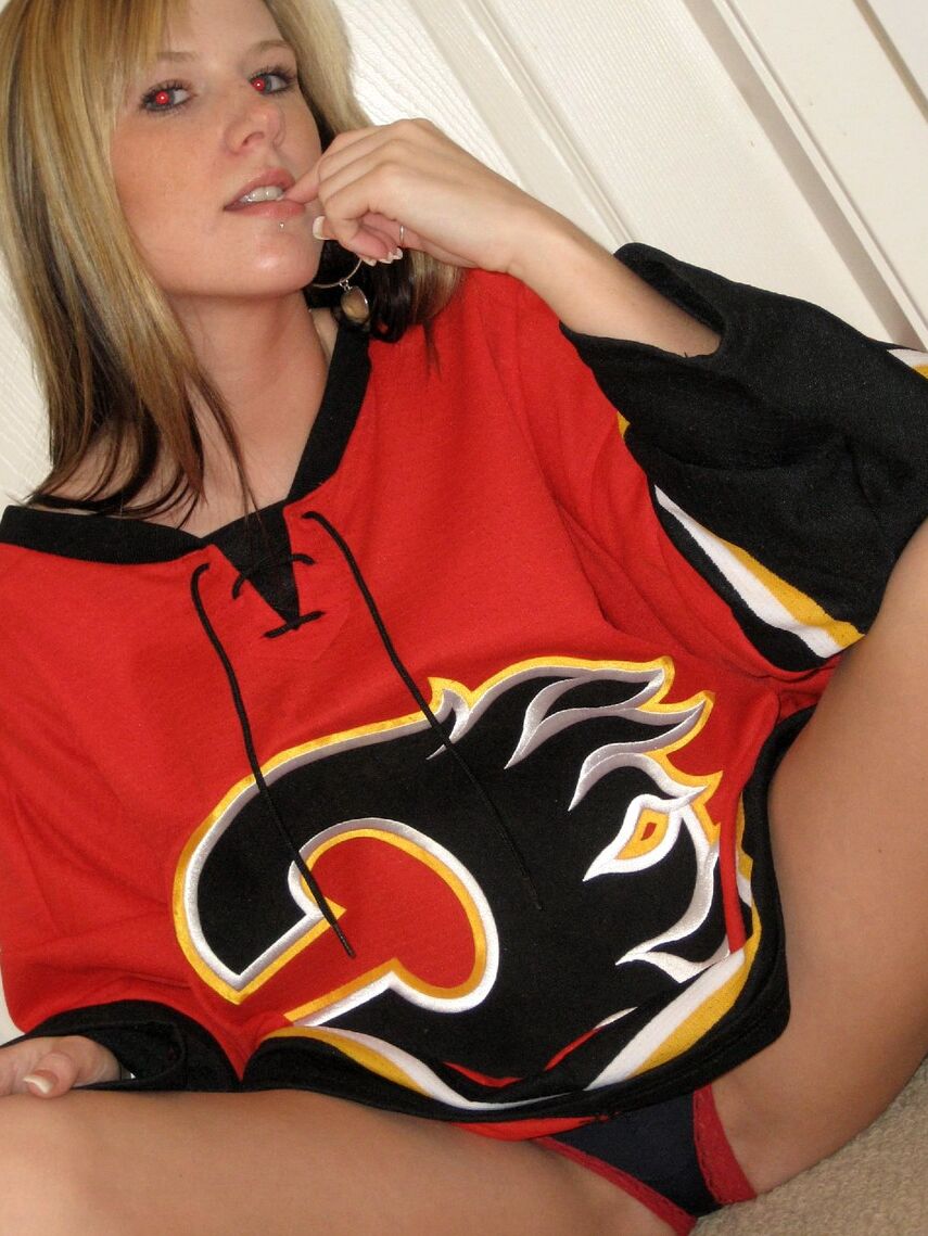 12P Watch as Cali strips out of her hockey jersey to nothing at all