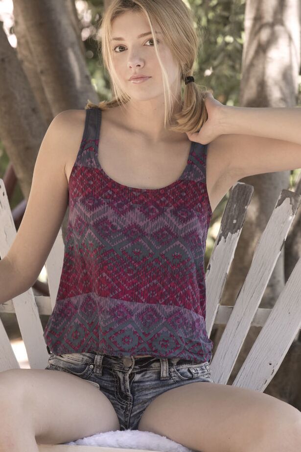 18P Teen first timer Lena Anderson vaunts her lithe body under a tree outside