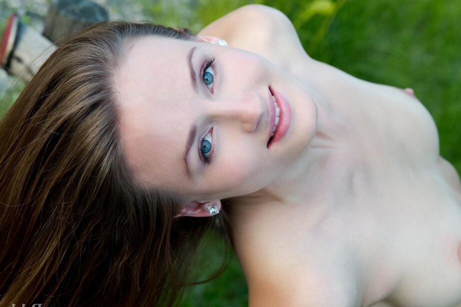 16P Fabulous teen Vittoria Amada has fun posing naked on the side of the road