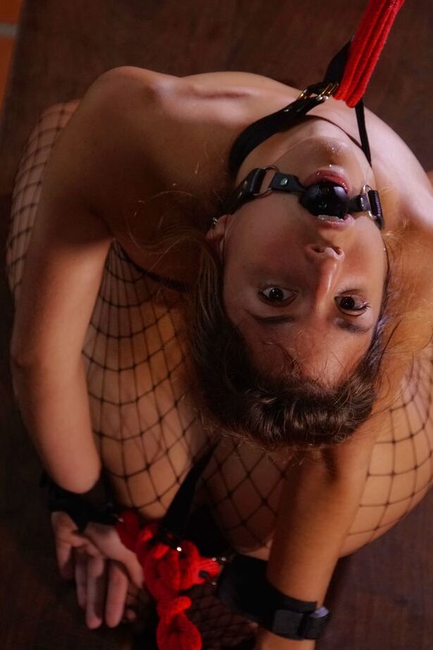 16P Ursula B stretches and pulls her black fishnet pantyhose, the she drools