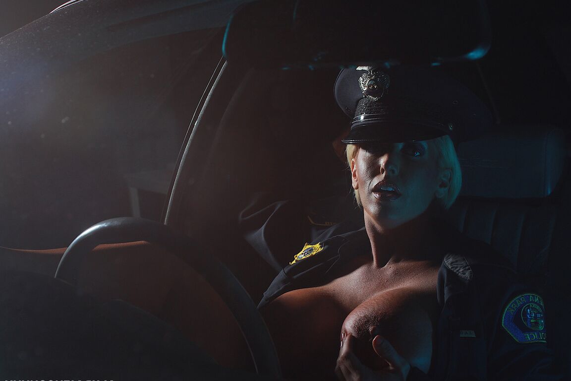 15P Policewoman Alura Jenson shows her off her big tits while in uniform