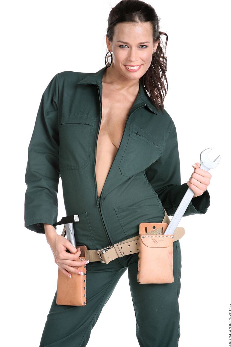 15P Gorgeous brunette Marie removes a jumpsuit to pose nude in a toolbelt and Docs